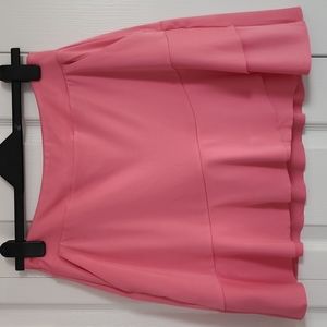 Greg Norman golf skort with pockets. Peach. Small.